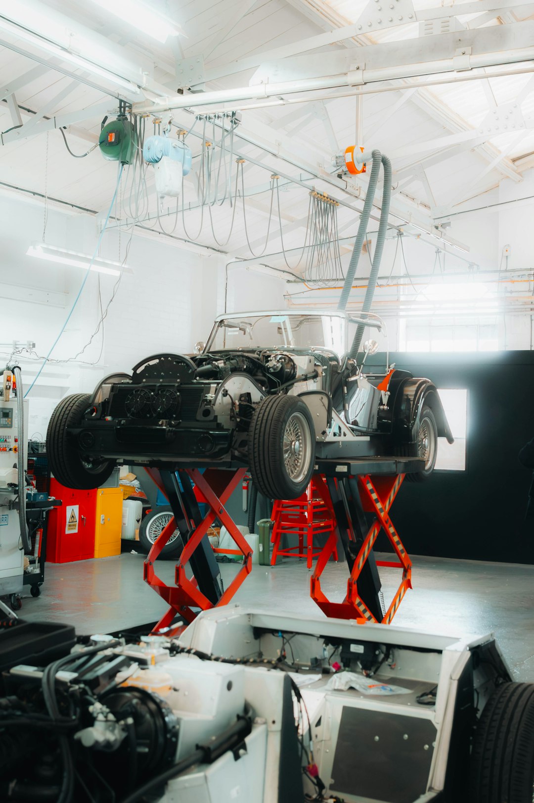 portfolio-03 a-car-being-worked-on-in-a-garage-3pgvmsft4le